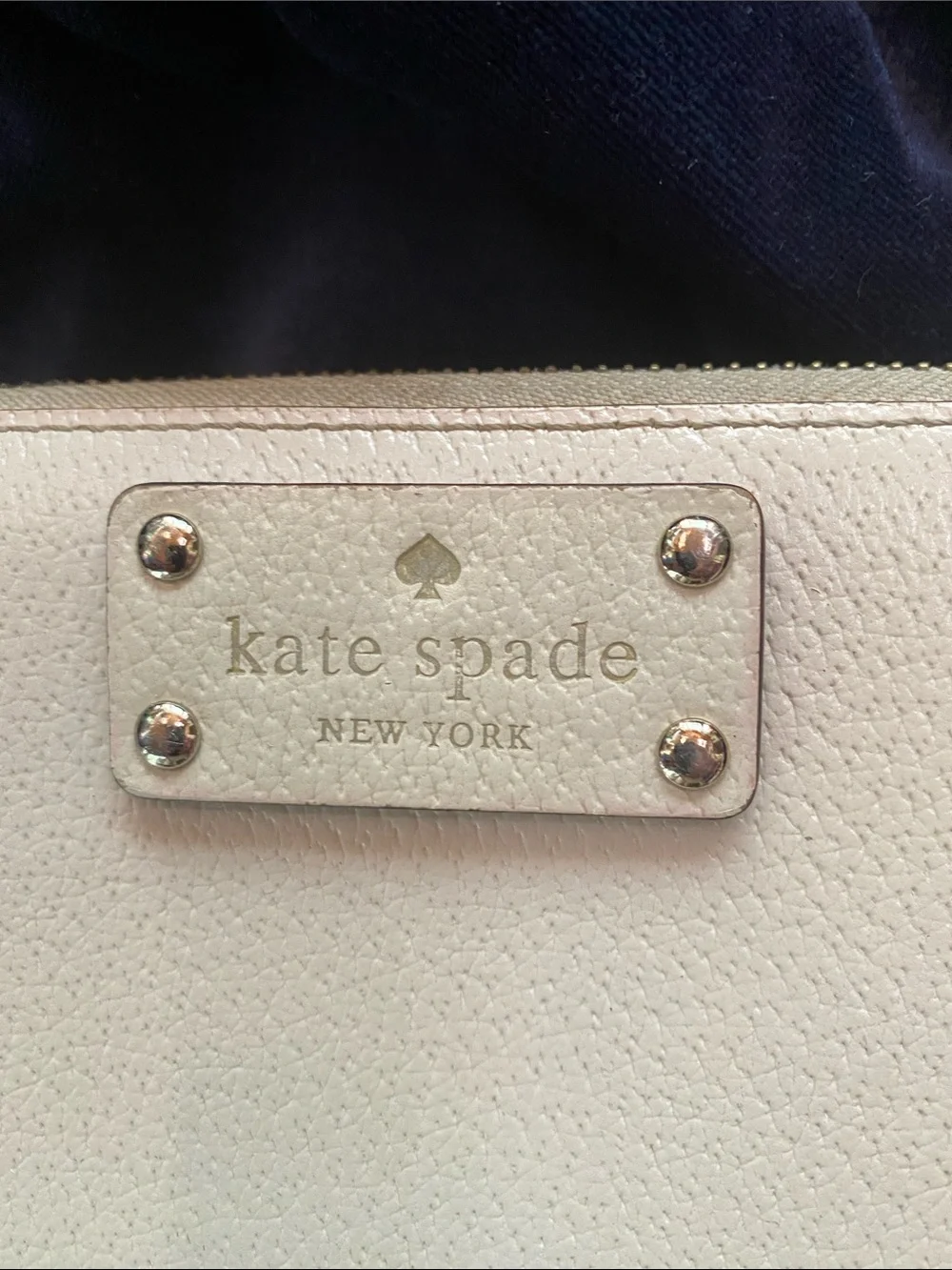 kate spade cream pebbled leather zip-around clutch wallet